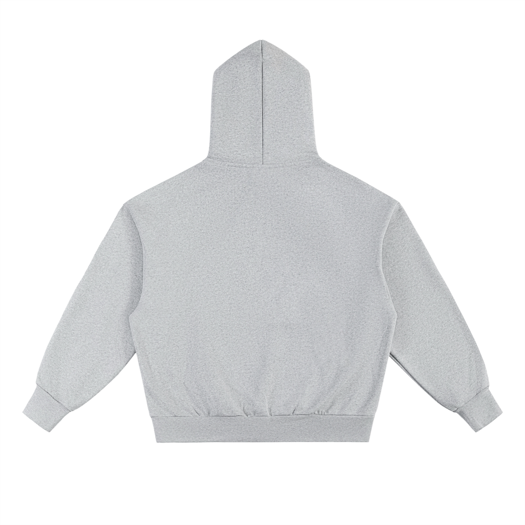 The Selma Hoodie, an oversized unisex sweatshirt in light gray, is shown laid flat from the back. Made from a soft cotton blend, it features long sleeves, ribbed cuffs and waistband, and has no patterns or decorations.