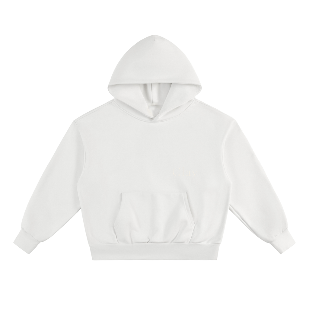 The Selma Hoodie is an oversized unisex hoodie made from a soft cotton blend with long sleeves, a front pouch pocket, and ribbed cuffs and waistband, shown against a white background.