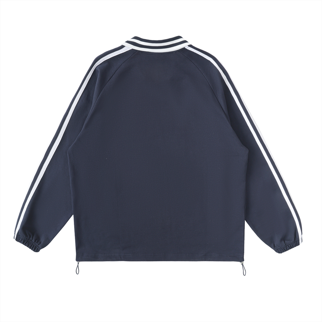 The Prattville Sweatshirt is a navy blue, long sleeve jacket shown from the back, featuring white stripes on the sleeves and collar, elastic cuffs, and a straight hem with adjustable drawstrings for a street vintage look.