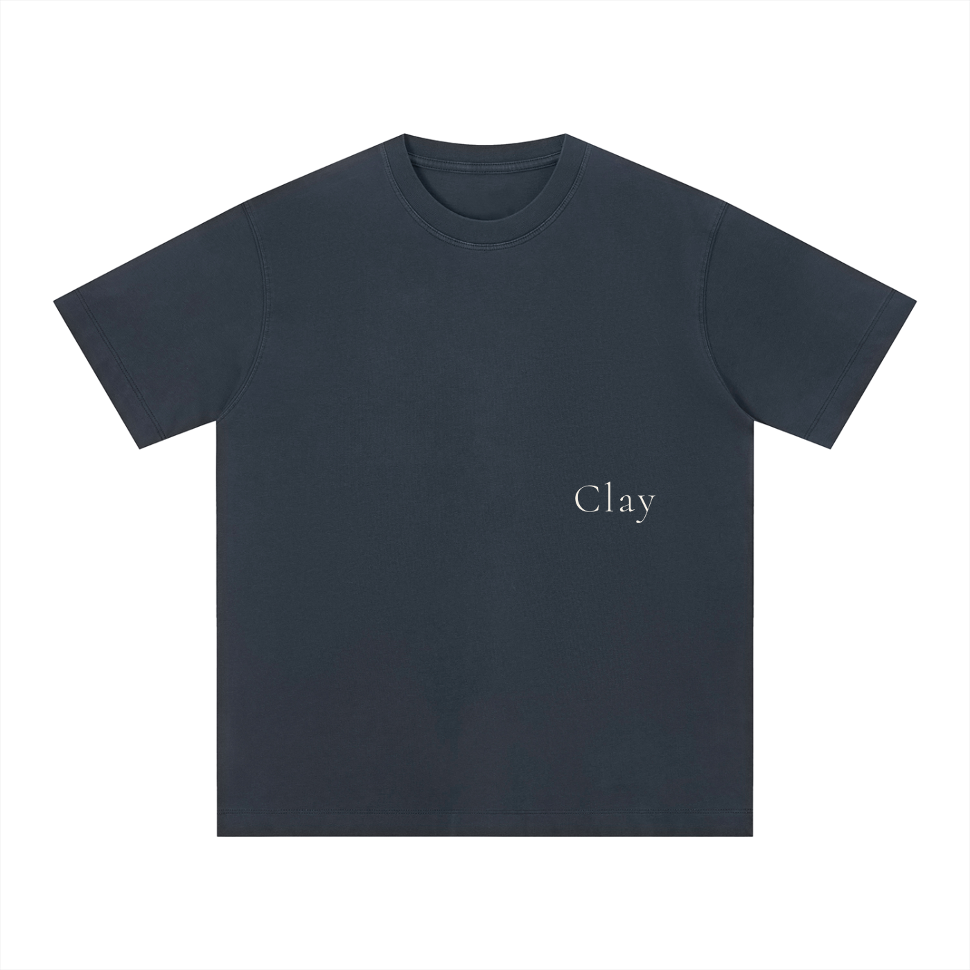 The Charleston Shirt is a loose-fit, unisex cotton tee in plain dark gray with "Clay" in small white letters on the left chest. Features short sleeves for daily comfort.