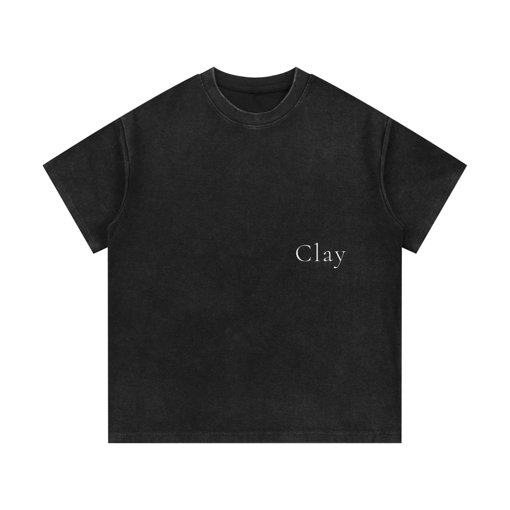 The Greenville Waffle Shirt is a black unisex cotton blend tee featuring "Clay" in small white serif text on the left chest. This casual short sleeve shirt delivers comfort and versatility for any occasion.