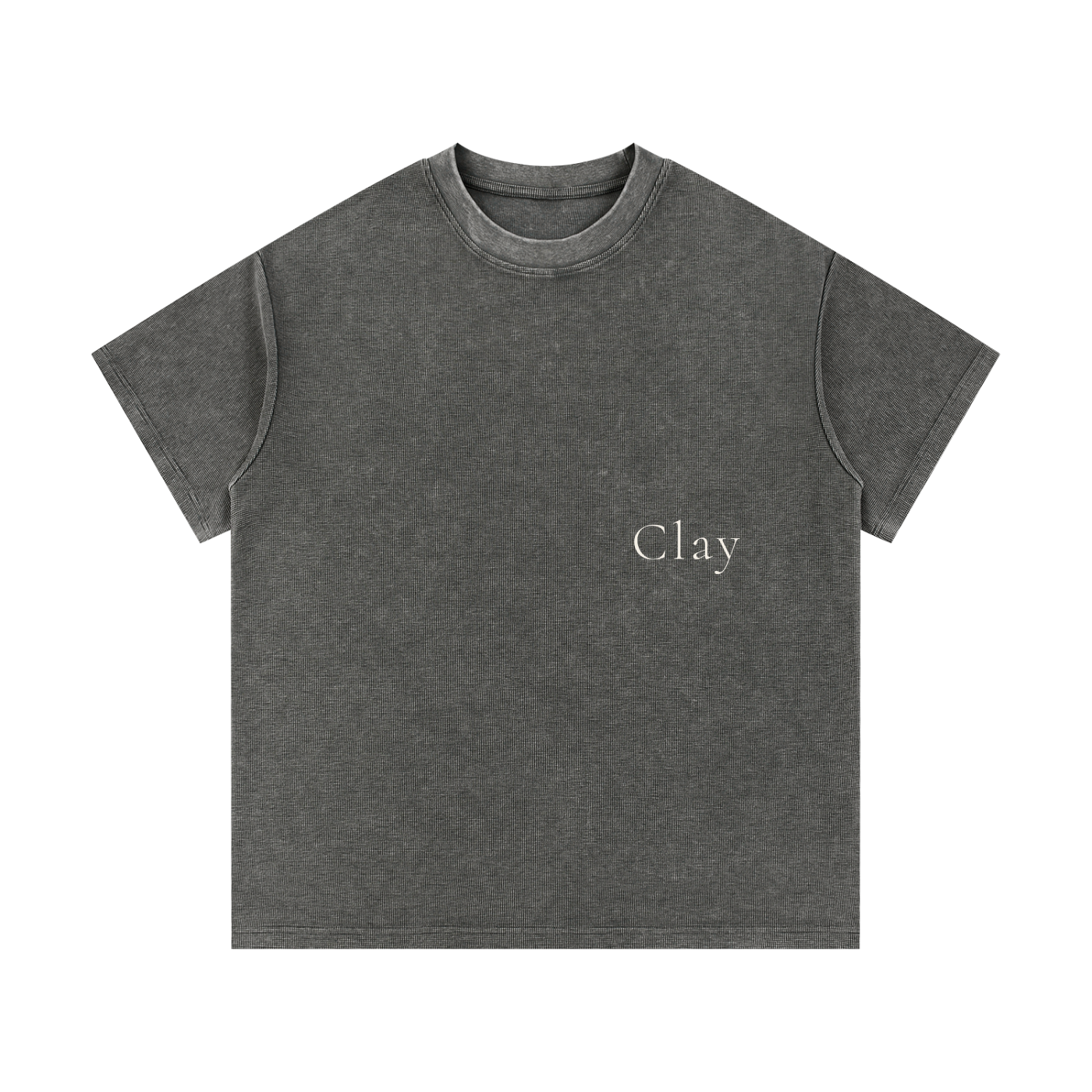 The Greenville Waffle Shirt is a loose-fit unisex cotton blend t-shirt in faded black, featuring short sleeves and "Clay" printed in small white letters on the left chest—ideal for casual summer streetwear.