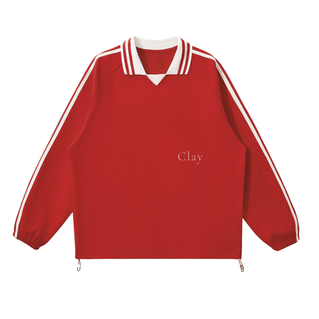 The Prattville Sweatshirt is a vintage red long-sleeve pullover featuring white stripes on the collar and sleeves, elastic cuffs, and “Clay” printed in small white letters on the front.
