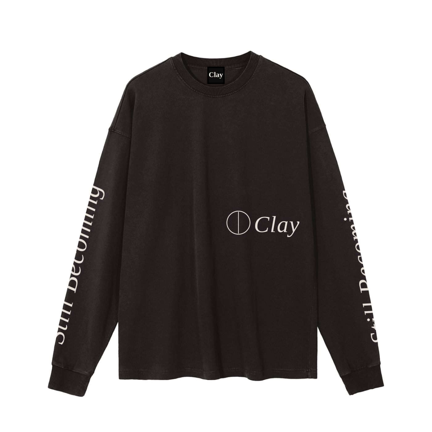 The Gatlinburg Long Sleeve T-Shirt is a black unisex cotton top featuring the Clay logo and circle graphic on the front, plus Still Becoming text on the sleeves. A stylish streetwear pick for your autumn winter wardrobe.