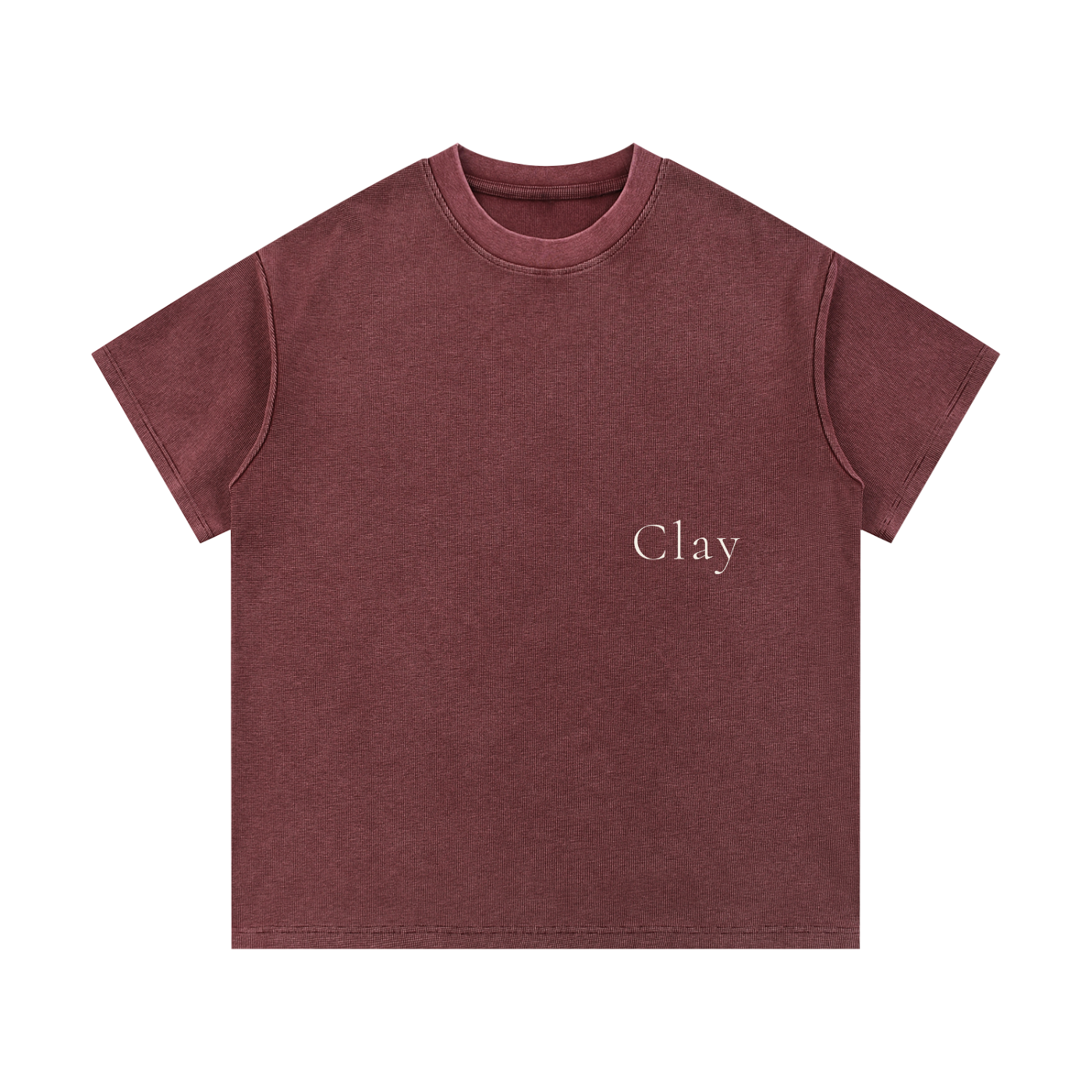 The Greenville Waffle Shirt is a maroon, loose-fit unisex summer tee with "Clay" in small white letters on the left chest—made from a comfortable cotton blend and perfect for casual streetwear.
