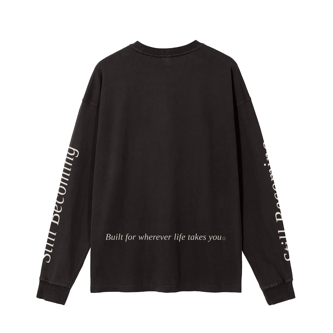 The Gatlinburg Long Sleeve T-Shirt is a unisex black cotton top with “Built for wherever life takes you” on the lower back and “Still Becoming” along the sleeves—perfect casual streetwear for autumn and winter.
